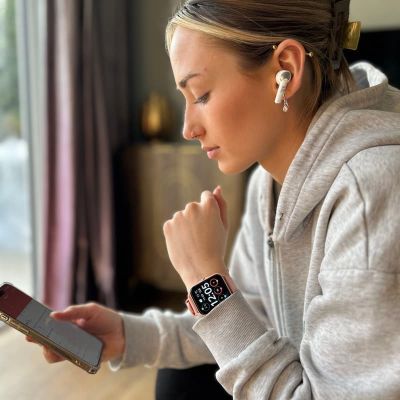 girl wearing tritek pro Pure noise cancelling earbuds