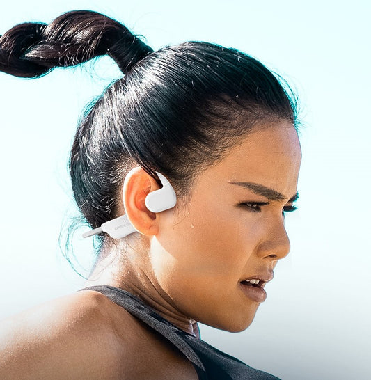 women wearing tri tek pro open ear air conduction headphones