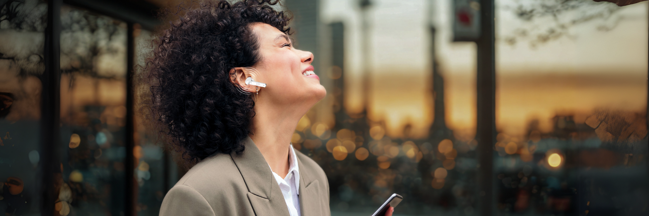 lady enjoying tri-tek pro PURE wireless earbuds