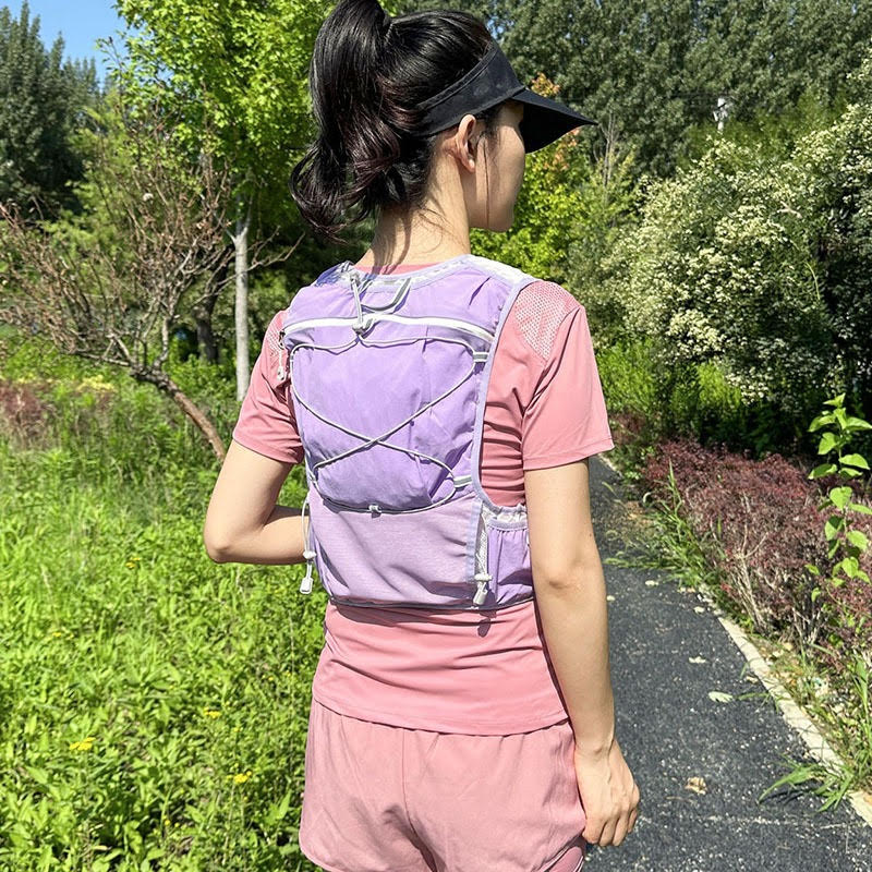 Lady wearing purple running vest
