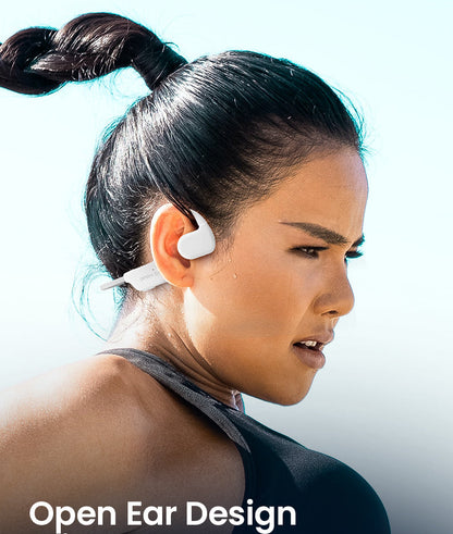 lady wearing open ear air conduction headphones